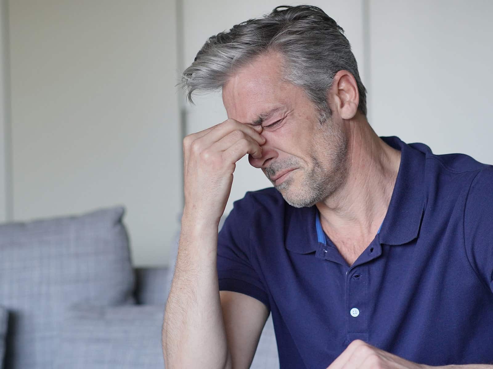 Man with sinus pain